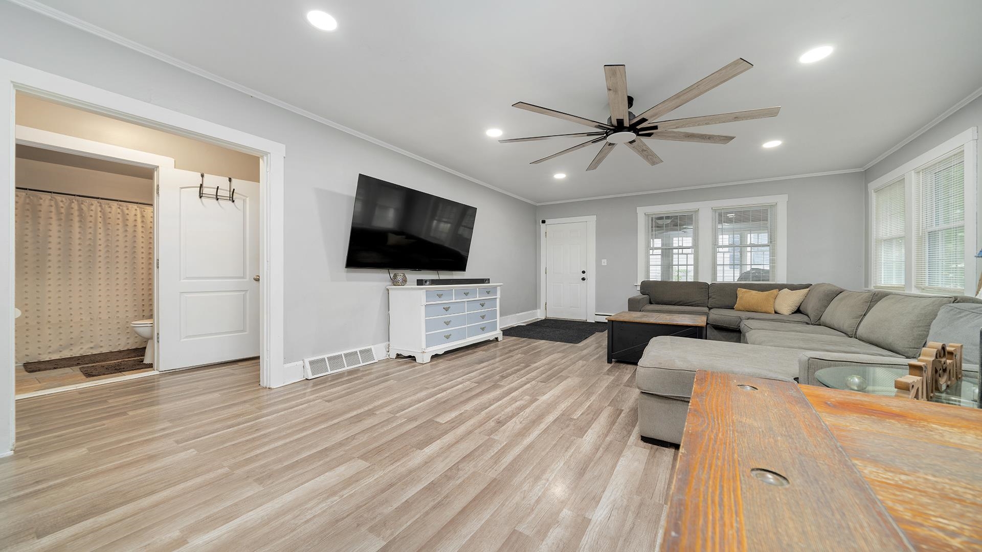 708 West Washington Street Oregon, IL 61061 - Photo 4 of 26 a living room with furniture and a flat screen tv