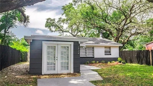 a view of front of house with a yard