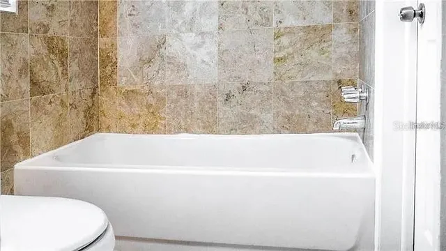 a bathroom with a bathtub