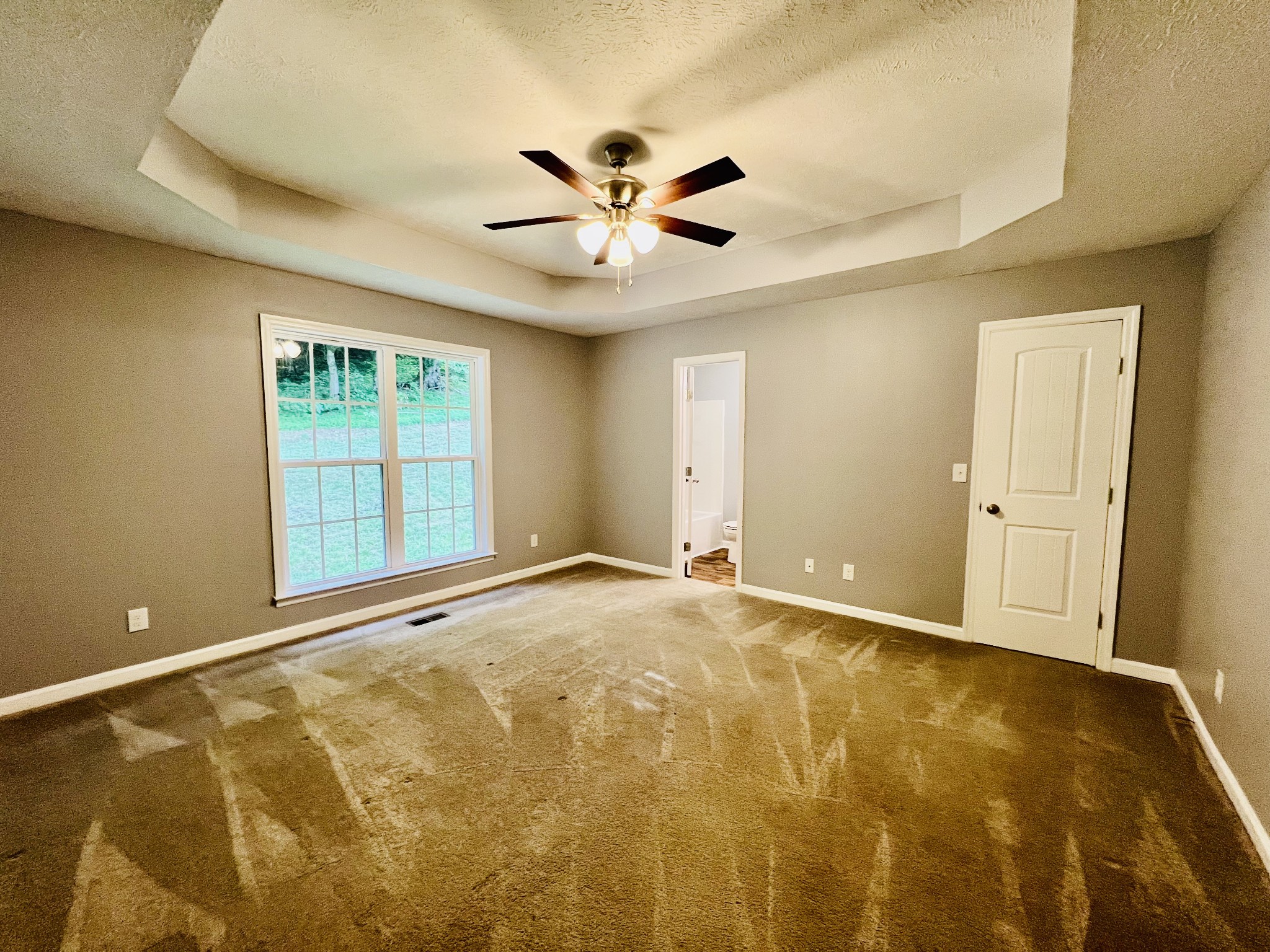 770 Bunker Hill Road Pulaski, TN 38478 - Photo 10 of 26 a view of an empty room with a window