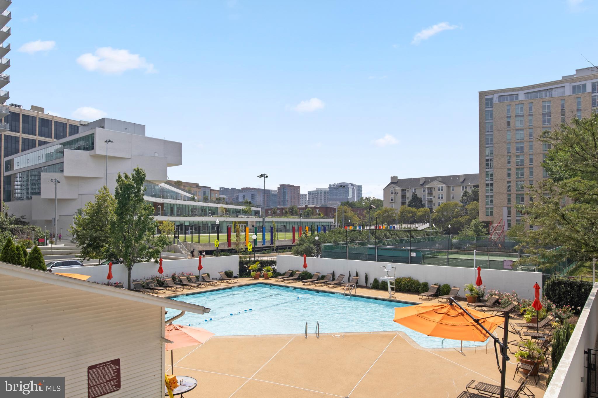 1530 Key Boulevard, Unit 426 Arlington, VA 22209 - Photo 40 of 43 a view of a swimming pool and a chairs