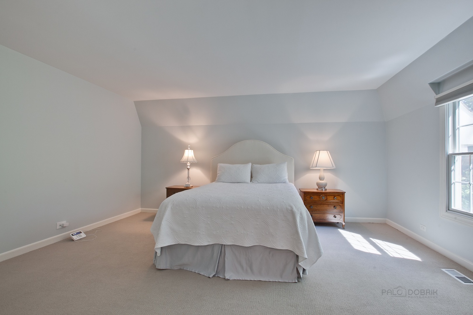 13 Forest Hills Road Lake Bluff, IL 60044 - Photo 15 of 24 a bedroom with a bed and a night stand
