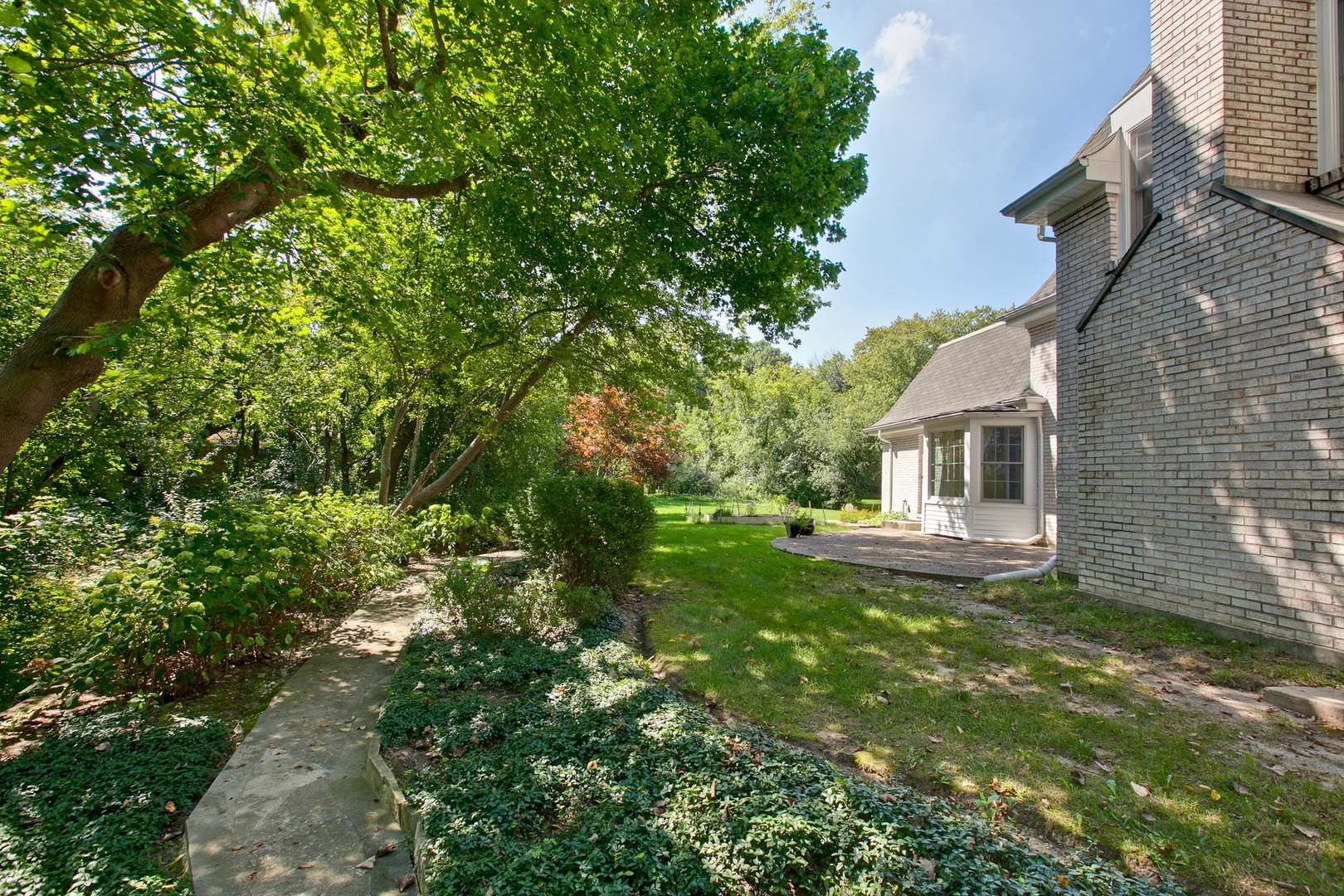 13 Forest Hills Road Lake Bluff, IL 60044 - Photo 24 of 24 a view of a house with a yard