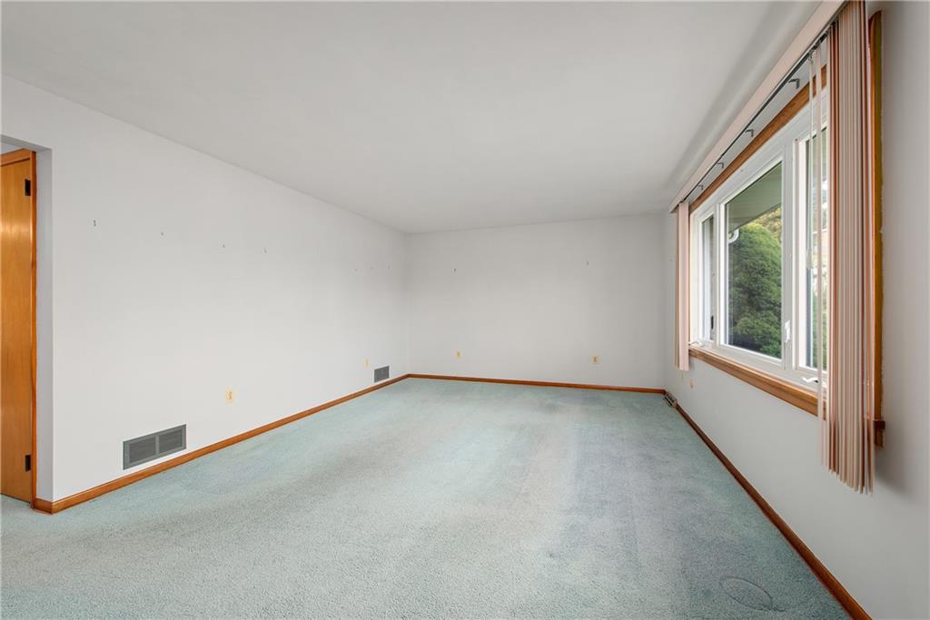 604 Davidson Drive Rochester, PA 15074 - Photo 5 of 25 a view of an empty room with a window