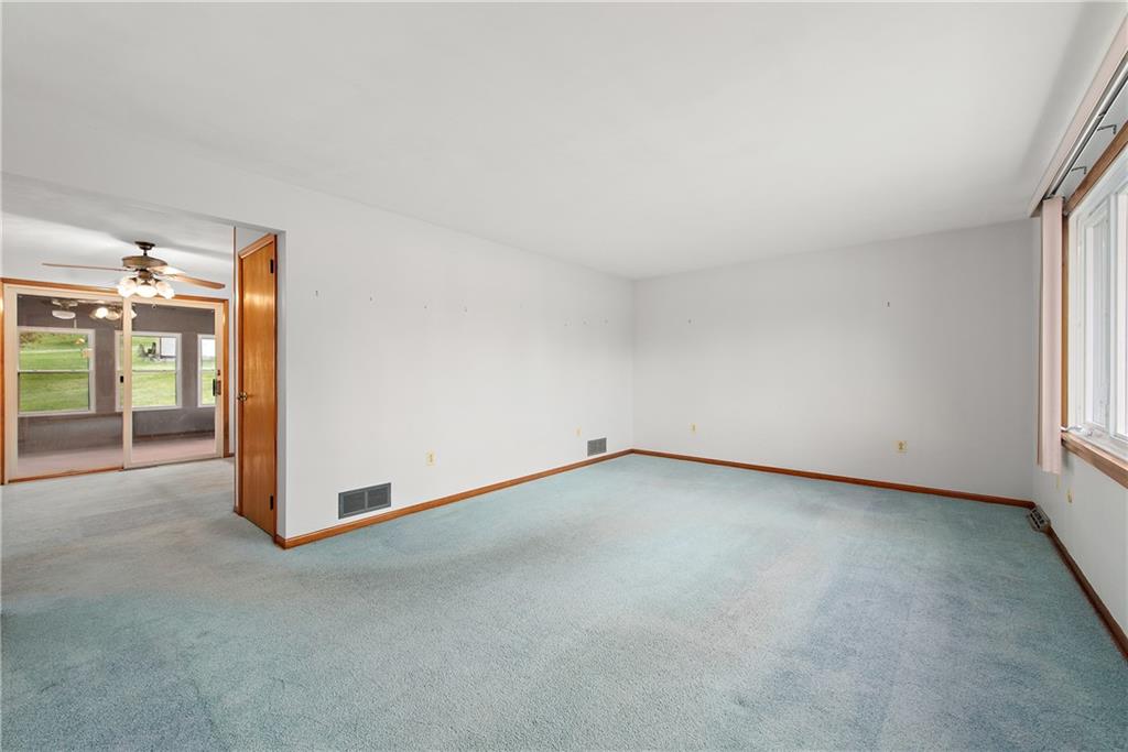604 Davidson Drive Rochester, PA 15074 - Photo 6 of 25 wooden floor in an empty room with a window