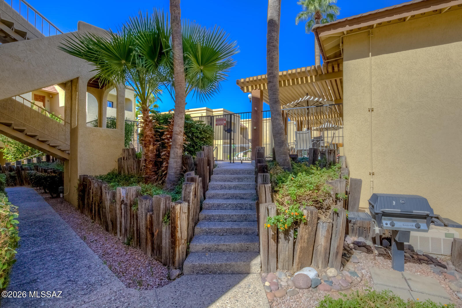 5500 North Valley View Road, Unit 123 Tucson, AZ 85718 - Photo 33 of 36 a view of a garden with patio