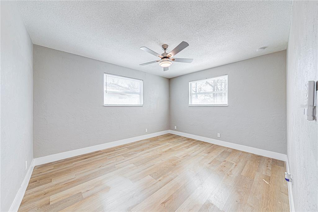 1648 Caldwell Road Daytona Beach, FL 32119 - Photo 34 of 45 a view of an empty room with a window