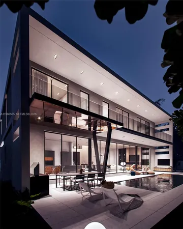 a lobby with furniture and a potted plants