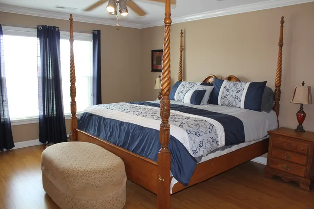 a bathroom with a sink a mirror and vanity