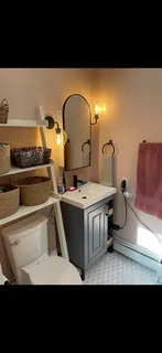 a bathroom with a sink and mirror