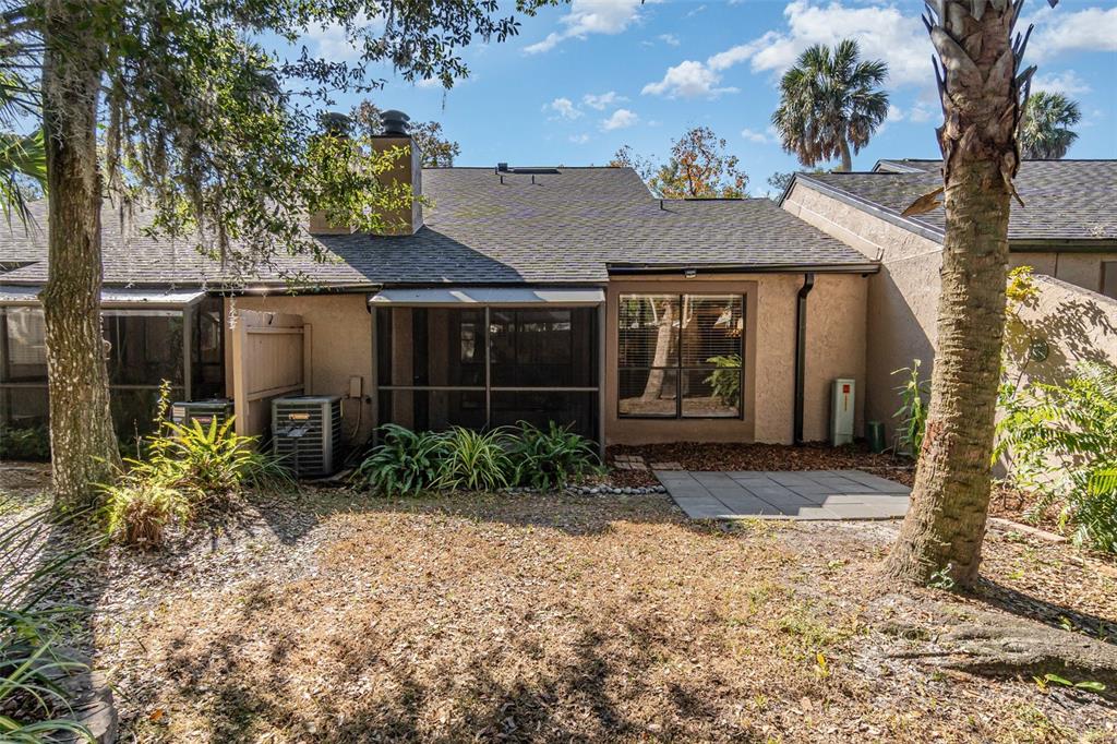 940 Douglas Avenue, Unit 175 Altamonte Springs, FL 32714 - Photo 28 of 44 a front view of a house with garden