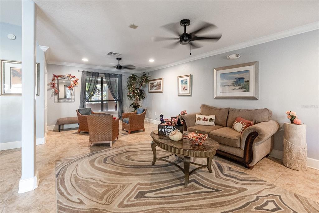 940 Douglas Avenue, Unit 175 Altamonte Springs, FL 32714 - Photo 34 of 44 a living room with furniture and a large window