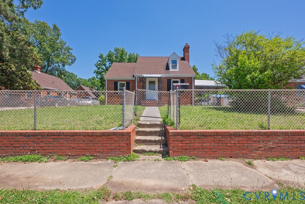 3400 Ryburn Road Richmond, VA 23234 - Photo 2 of 45 Brick-clad residence featuring a dormer window and