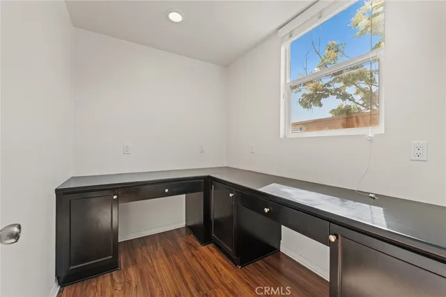 a view of a sink and cabinets
