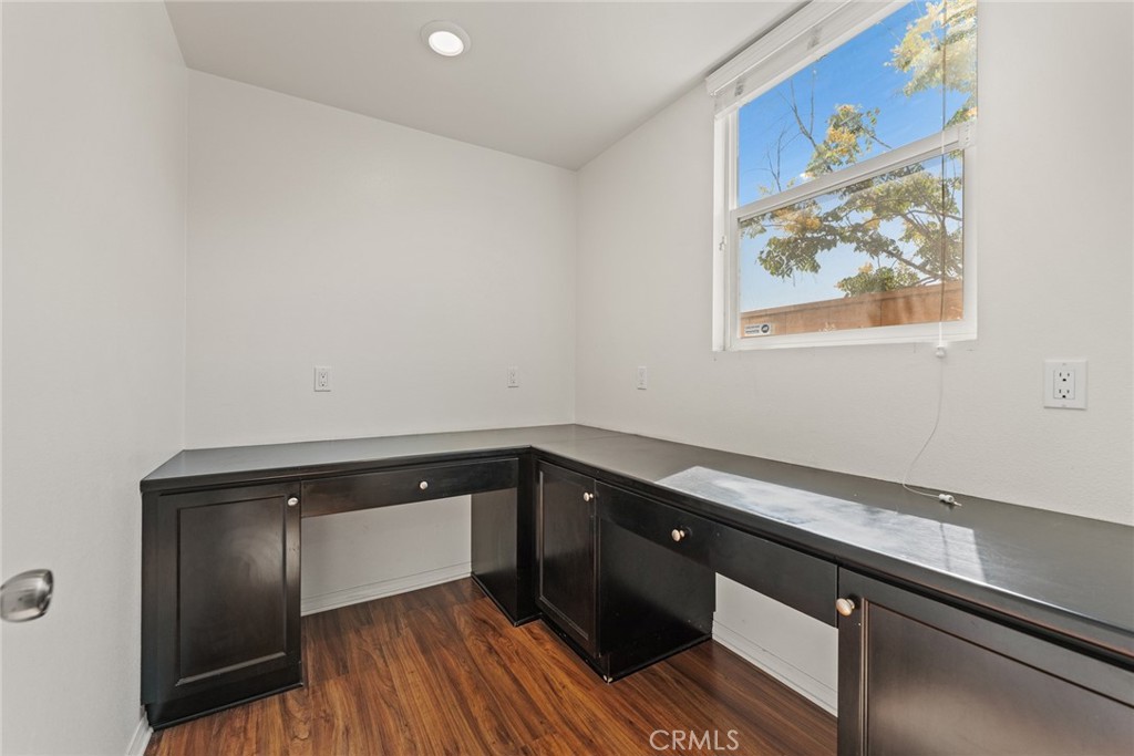8022-8022 Sea Salt Avenue Fontana, CA 92336 - Photo 19 of 35 a view of a sink and cabinets
