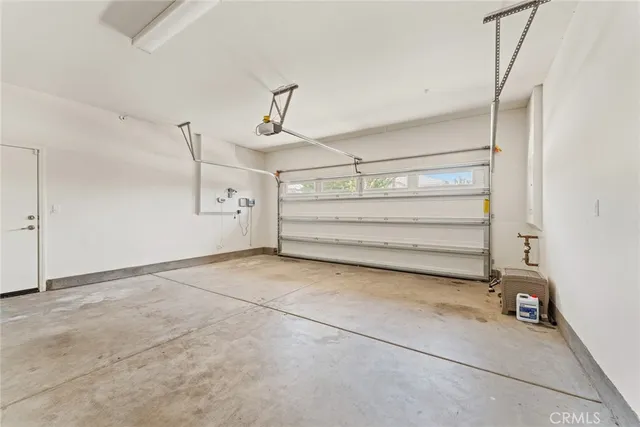 a view of room that has a bed