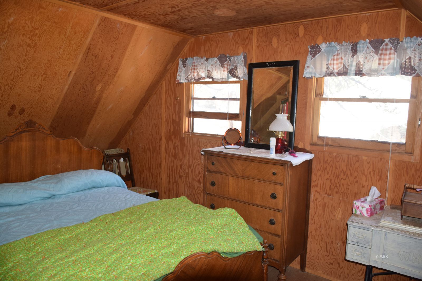 4 Whitney Portal Road Lone Pine, CA 93545 - Photo 12 of 20 a bedroom with a bed and a dresser