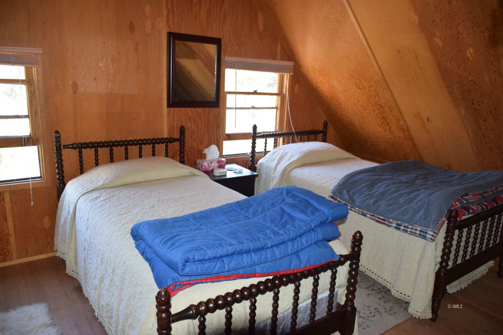 4 Whitney Portal Road Lone Pine, CA 93545 - Photo 13 of 20 a bedroom with two beds and a window