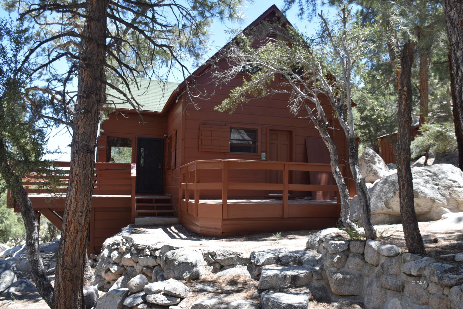 4 Whitney Portal Road Lone Pine, CA 93545 - Photo 2 of 20 a front view of a house with a yard covered with snow