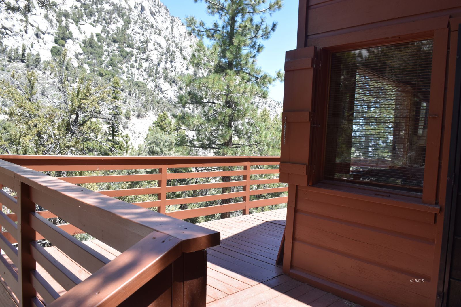 4 Whitney Portal Road Lone Pine, CA 93545 - Photo 4 of 20 a view of a balcony with a bench