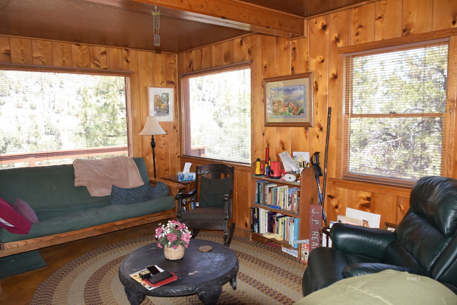 4 Whitney Portal Road Lone Pine, CA 93545 - Photo 6 of 20 a living room with furniture and a large window