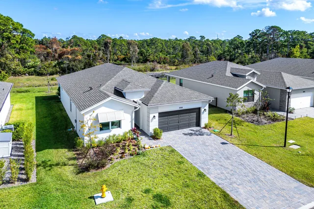 a aerial view of a house with garden