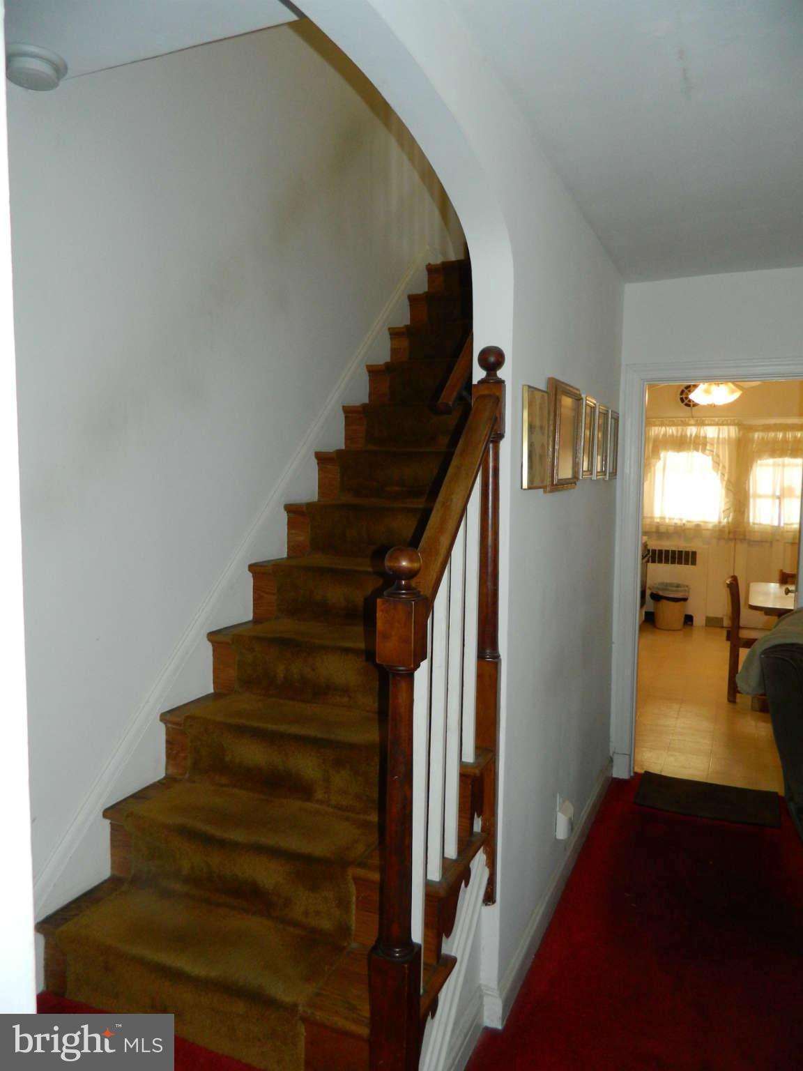 3834 Monterey Road Baltimore, MD 21218 - Photo 14 of 26 a view of entryway and hall with wooden floor