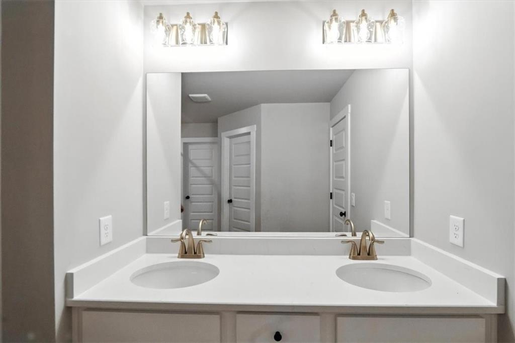 277 Rachel Lane Hartwell, GA 30643 - Photo 34 of 35 a bathroom with a sink and a mirror