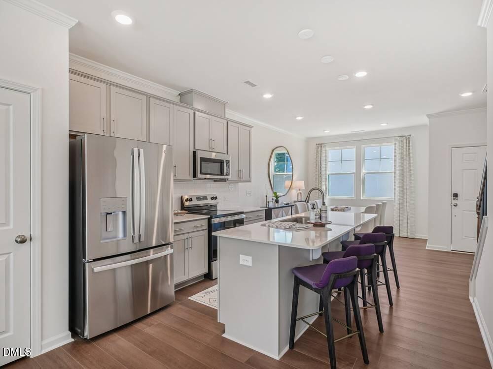 3101 White Blossom Court, Unit SAVANNAH 3109 Raleigh, NC 27610 - Photo 2 of 20