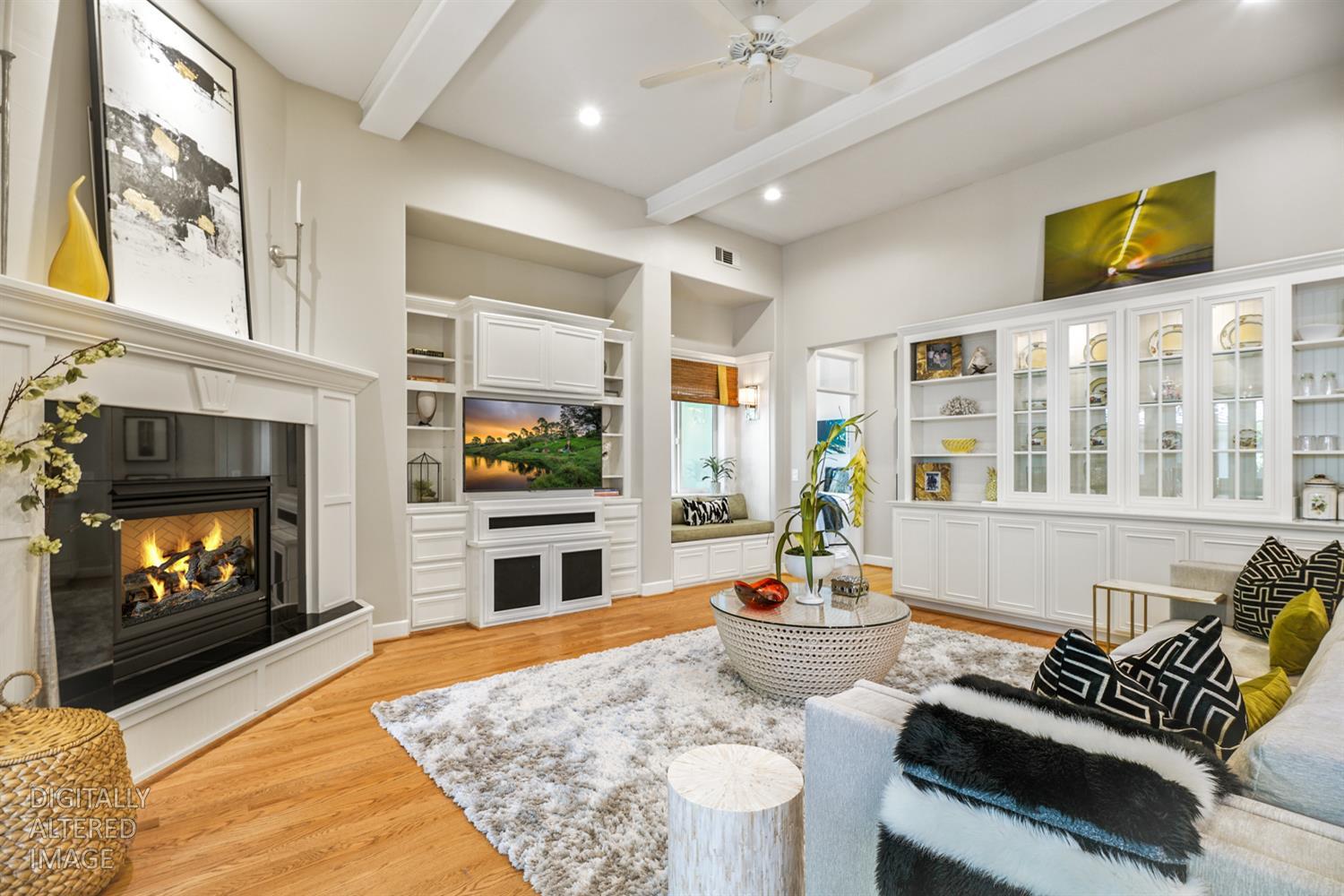 5512 Riviera Granite Bay, CA 95746 - Photo 26 of 76 a living room with furniture fireplace and flat screen tv