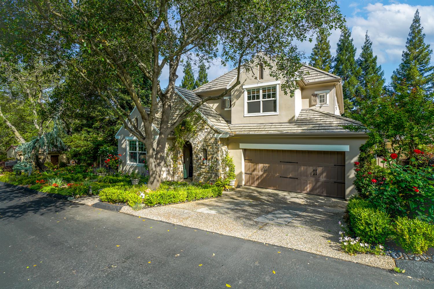 5512 Riviera Granite Bay, CA 95746 - Photo 3 of 76 a front view of a house with a yard and garage