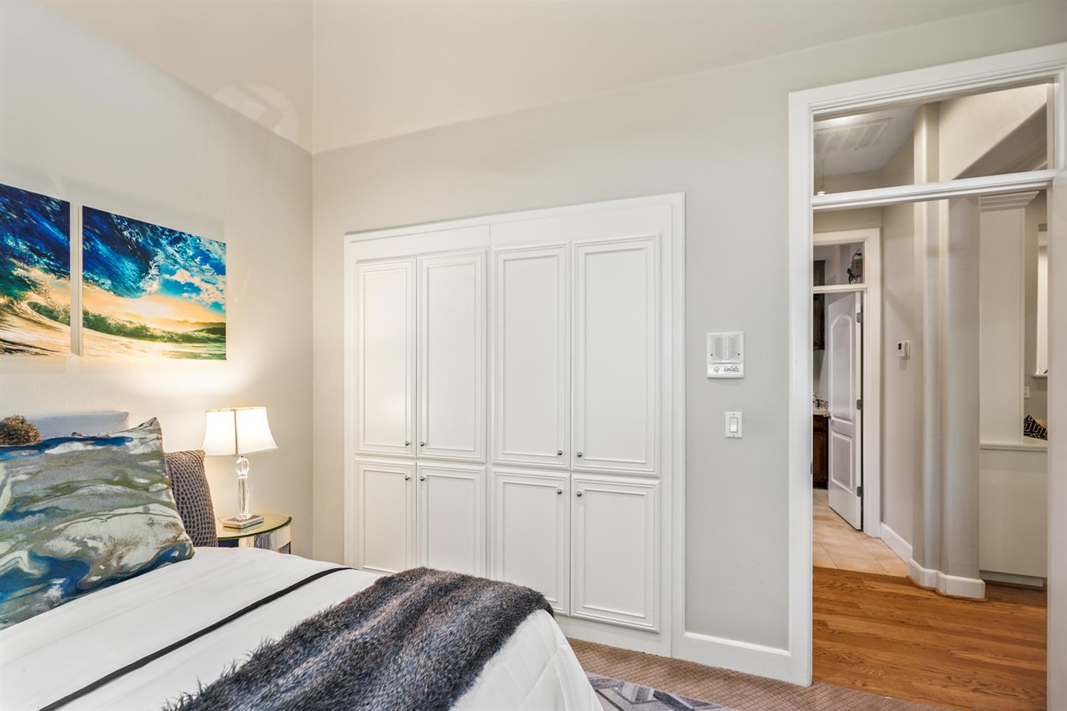 5512 Riviera Granite Bay, CA 95746 - Photo 32 of 76 a bedroom with a bed and a mirror