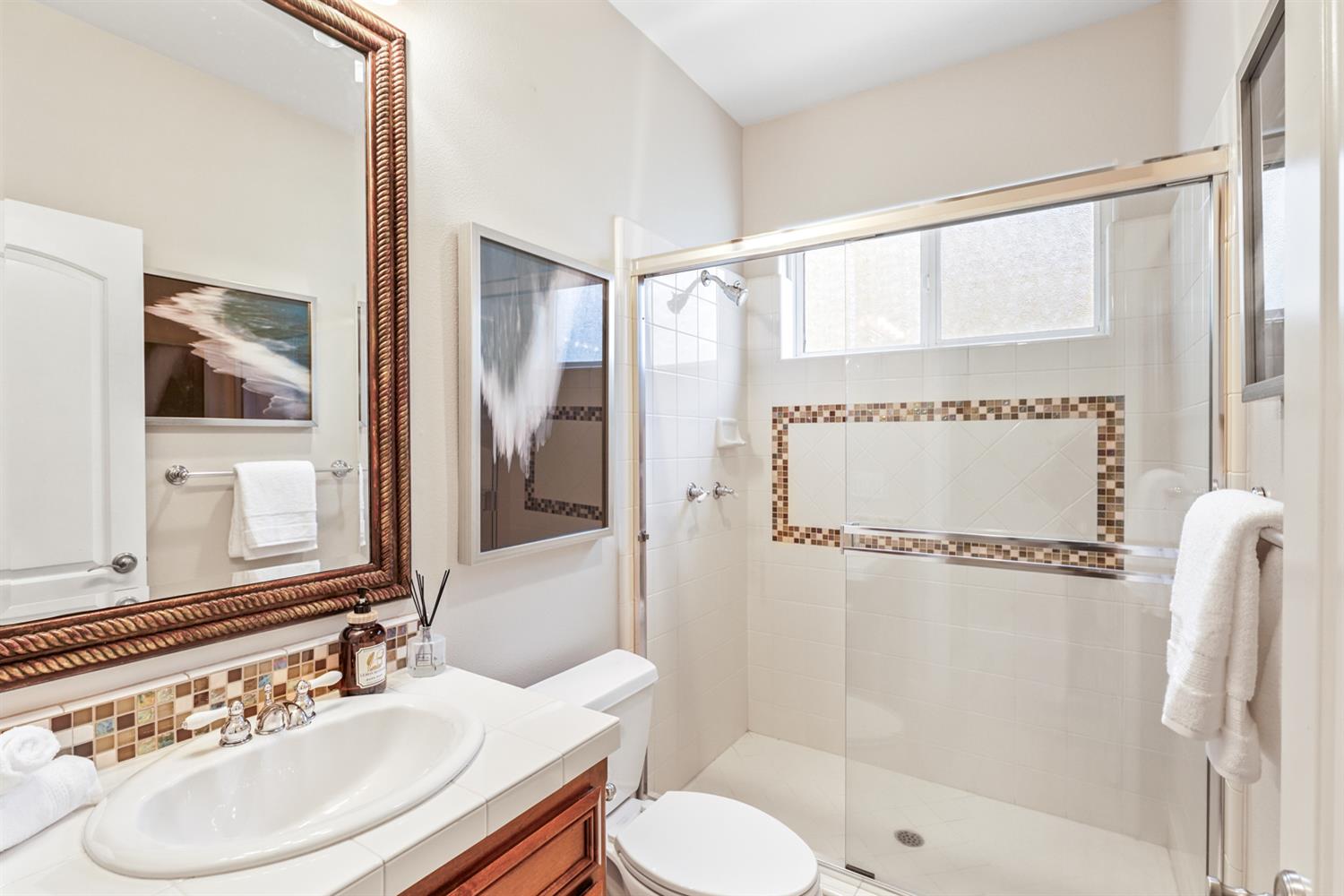 5512 Riviera Granite Bay, CA 95746 - Photo 33 of 76 a bathroom with a sink toilet and shower