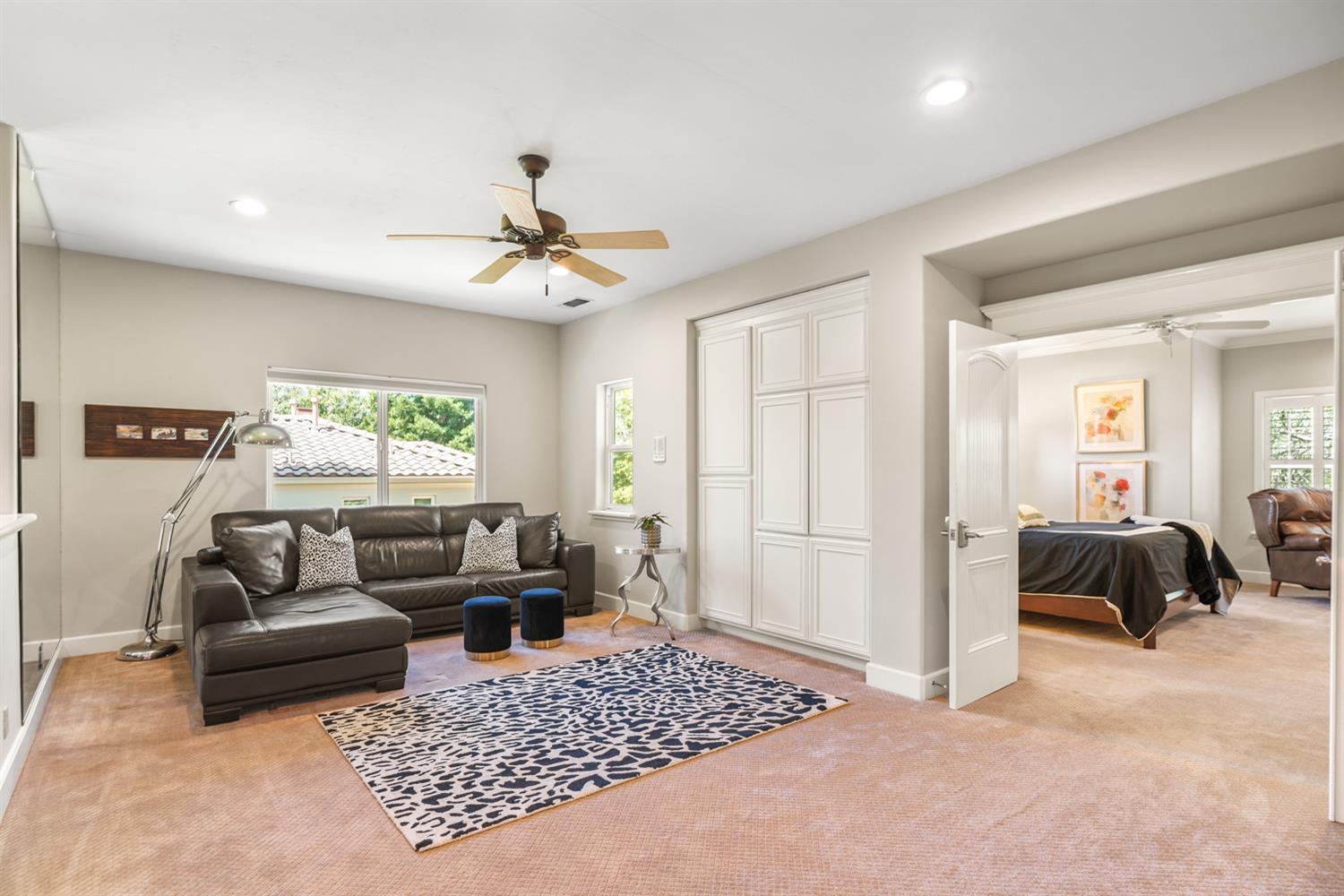 5512 Riviera Granite Bay, CA 95746 - Photo 36 of 76 a living room with furniture ceiling fan and a rug