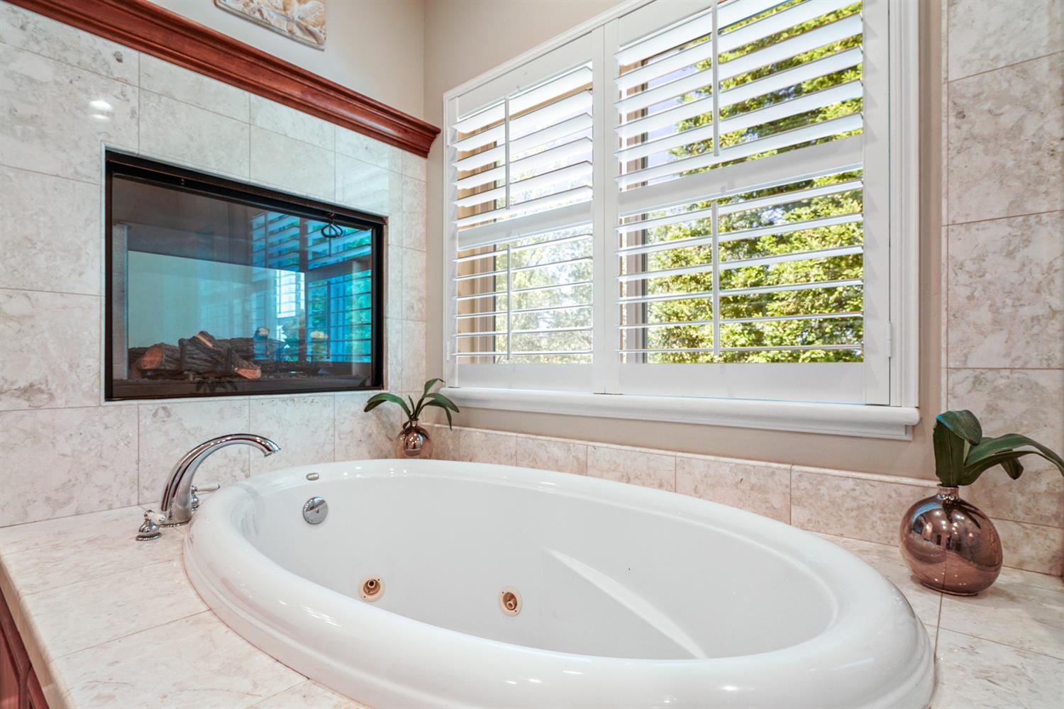 5512 Riviera Granite Bay, CA 95746 - Photo 45 of 76 a bathroom with a tub and a large window