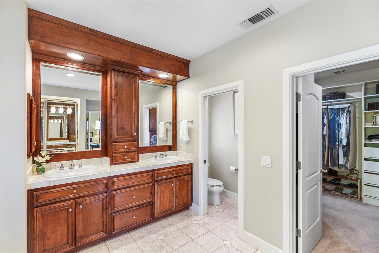 5512 Riviera Granite Bay, CA 95746 - Photo 46 of 76 a spacious bathroom with a granite countertop sink mirror and a