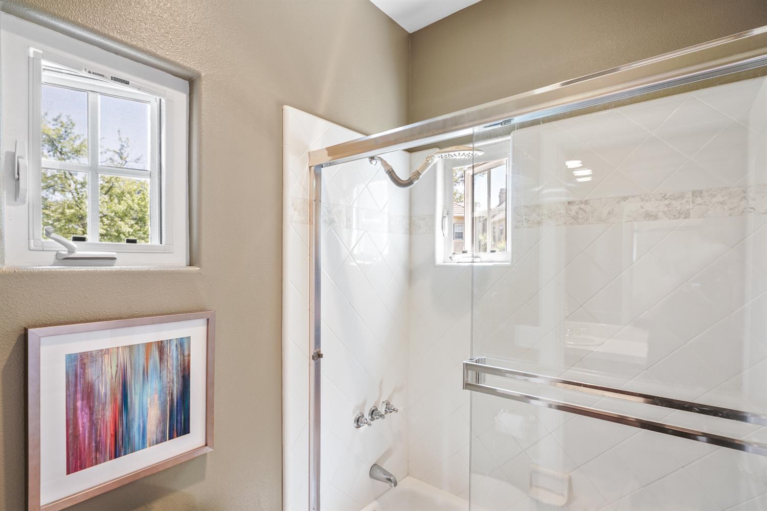 5512 Riviera Granite Bay, CA 95746 - Photo 53 of 76 a bathroom with a shower and a window