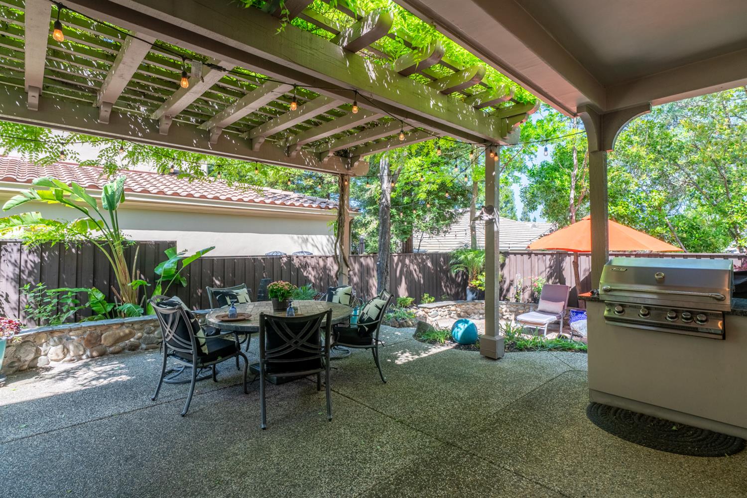 5512 Riviera Granite Bay, CA 95746 - Photo 6 of 76 a view of a patio with chairs and a table