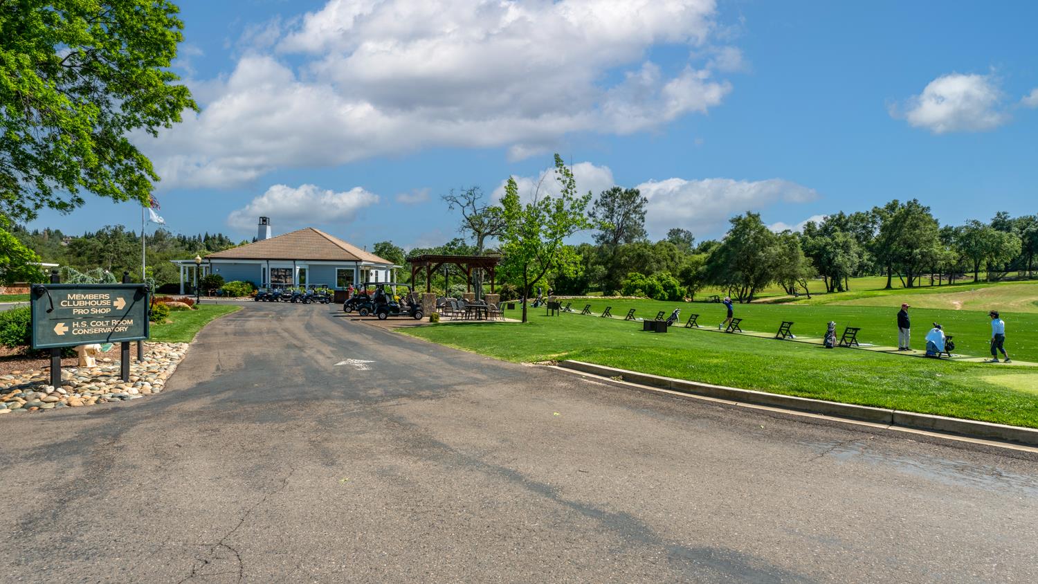 5512 Riviera Granite Bay, CA 95746 - Photo 67 of 76 a view of a street with a big yard and a large tree