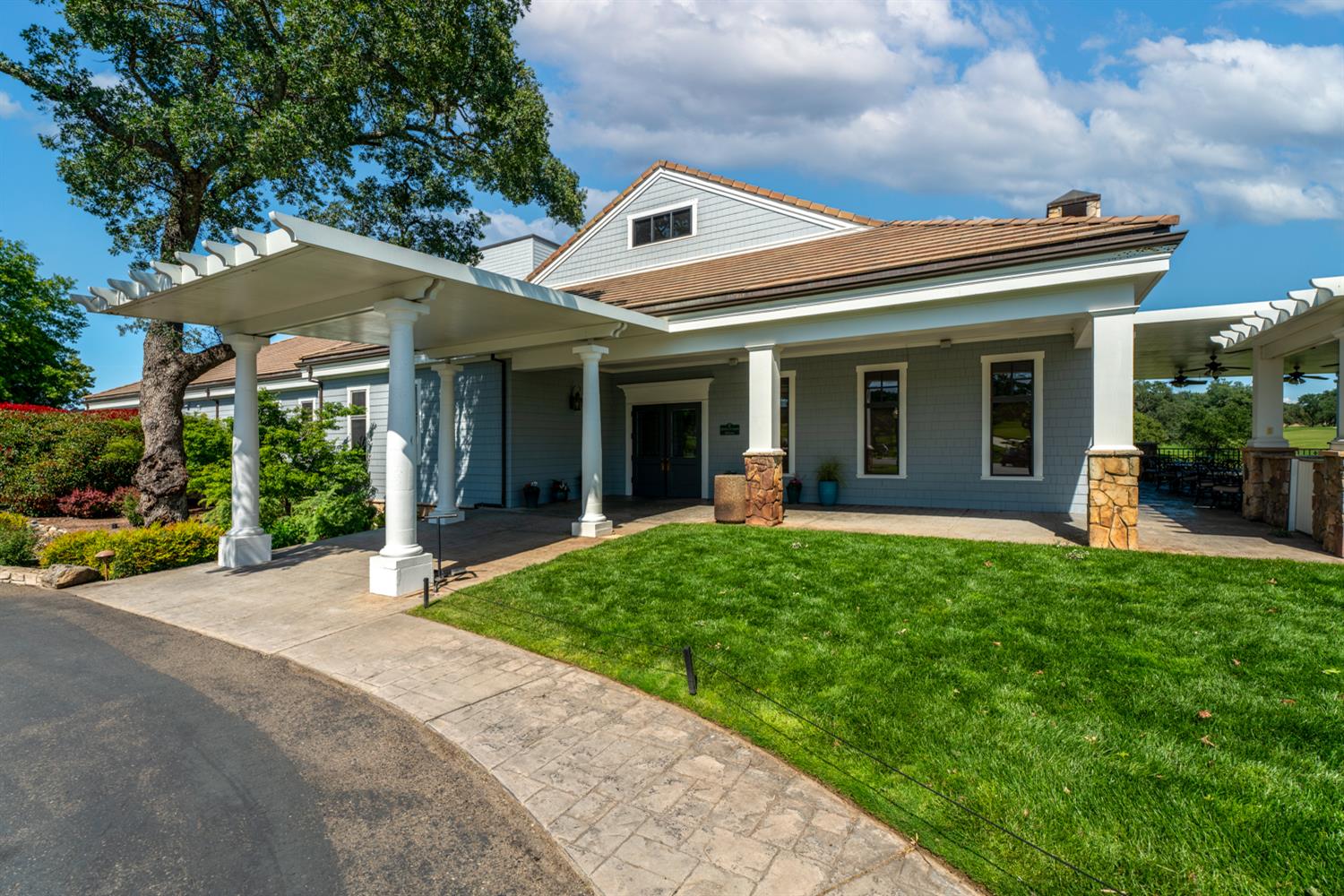 5512 Riviera Granite Bay, CA 95746 - Photo 68 of 76 a front view of a house with a yard and porch