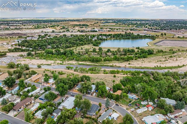 1326 Forest Road Colorado Springs, CO 80906 - Photo 21 of 22 Drone / aerial view featuring a water view