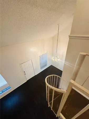 a view of balcony with furniture