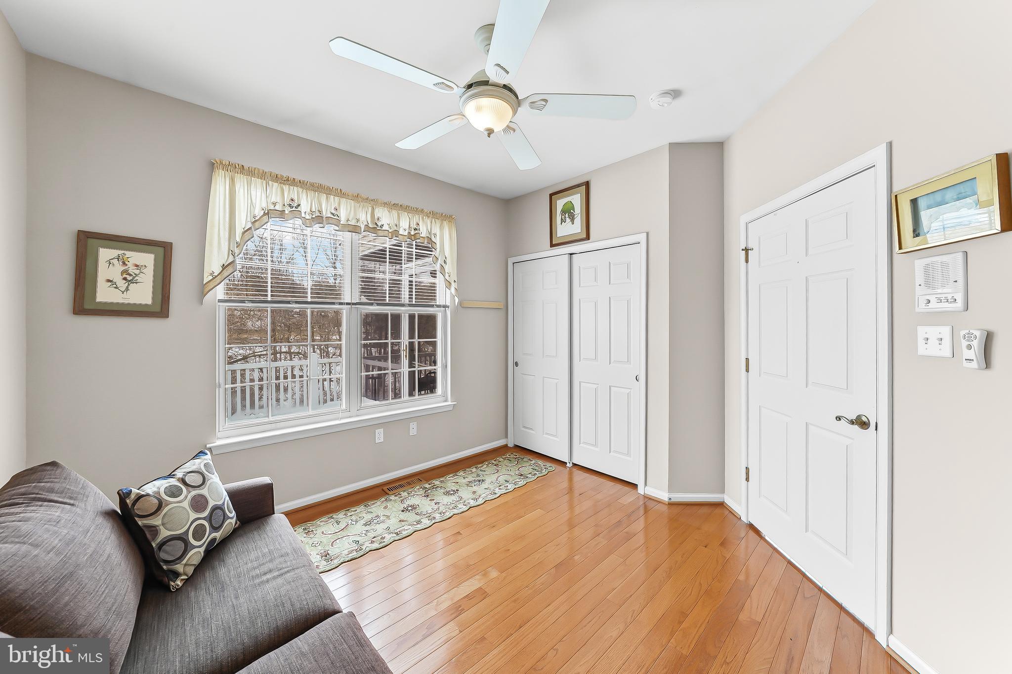 1299 Country Club Drive Springfield, PA 19064 - Photo 20 of 33 a living room with furniture and a window
