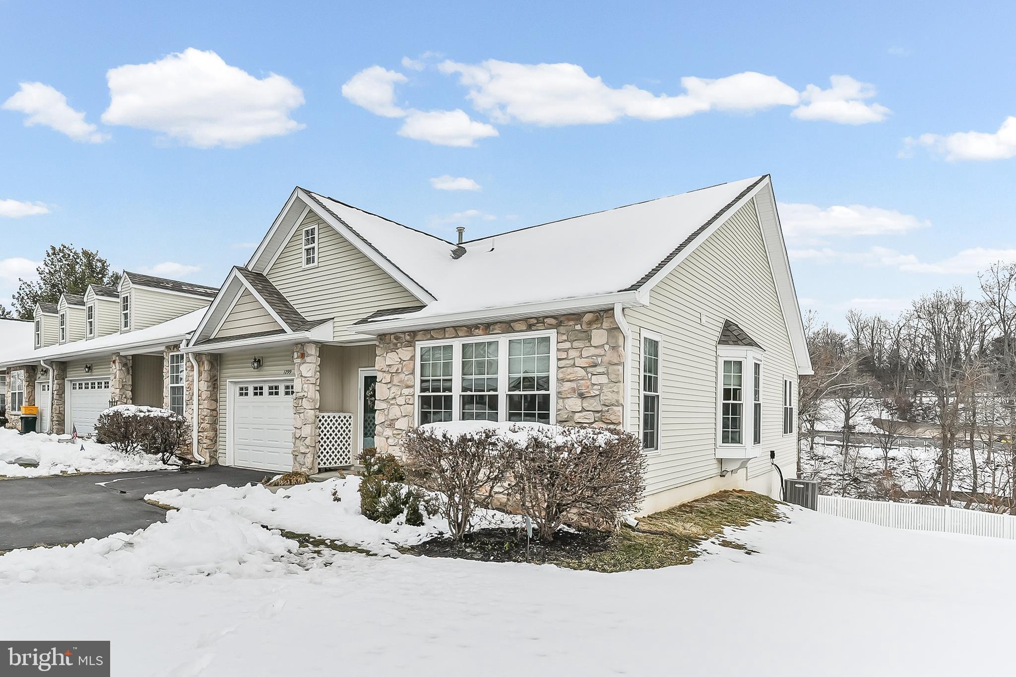 1299 Country Club Drive Springfield, PA 19064 - Photo 33 of 33 a view of a house with a yard covered in snow