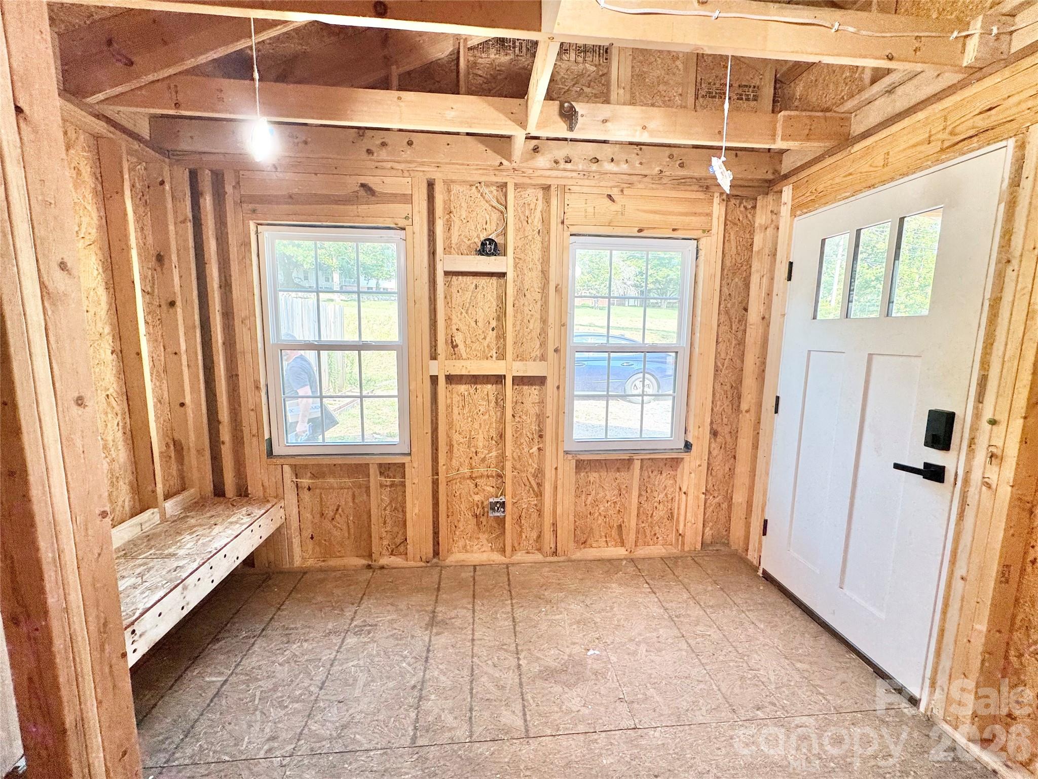 714 Dudley Shoals Road Granite Falls, NC 28630 - Photo 3 of 15 a view of a bathroom with a tub and window