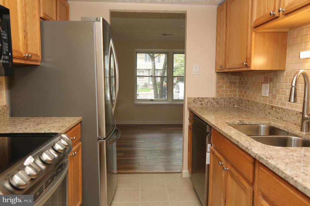 8338 Windfall Road Springfield, VA 22153 - Photo 11 of 28 New Flooring, Cabinets, Faucet and Sink