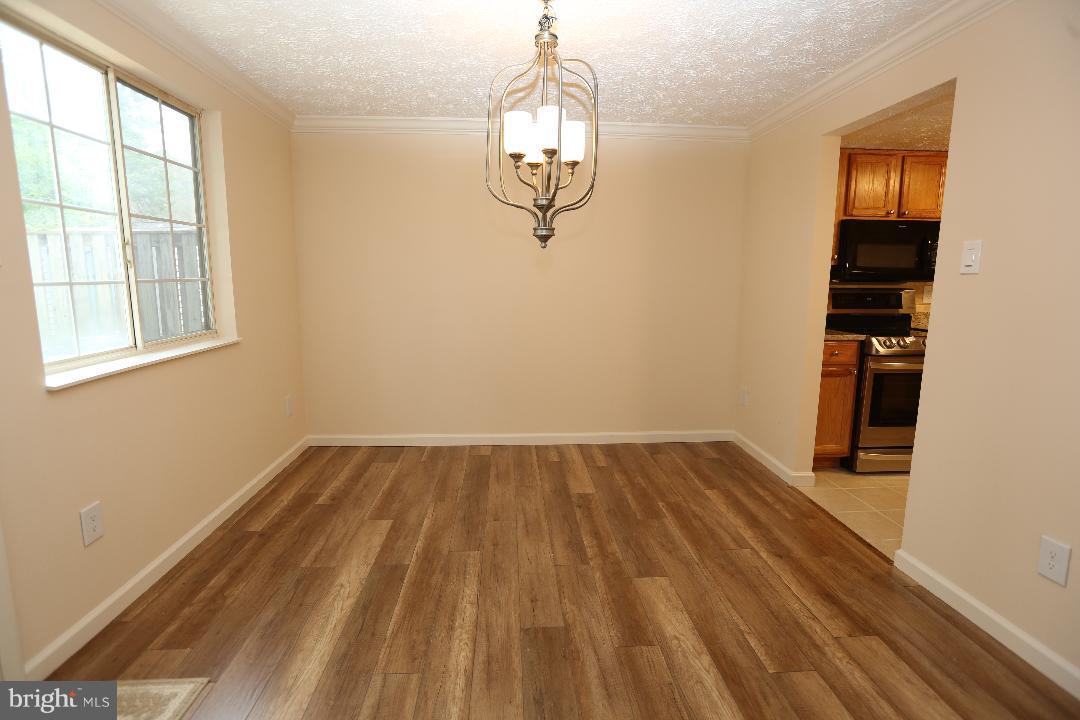 8338 Windfall Road Springfield, VA 22153 - Photo 13 of 28 View of Dining Room, Hardwood Floors New Light