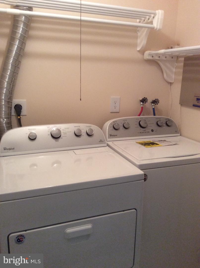 8338 Windfall Road Springfield, VA 22153 - Photo 19 of 28 Laundry Closet with Washer and Dryer