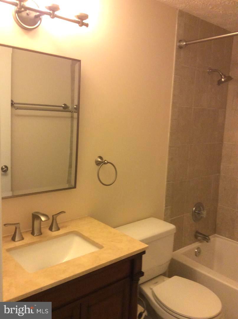 8338 Windfall Road Springfield, VA 22153 - Photo 22 of 28 Second Bedroom with Tub All Updated