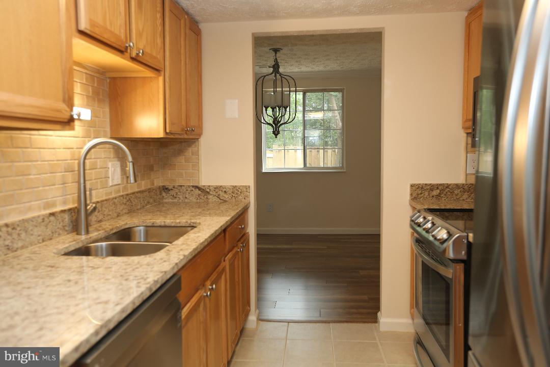8338 Windfall Road Springfield, VA 22153 - Photo 8 of 28 Update Faucet and Sink, light Fixture